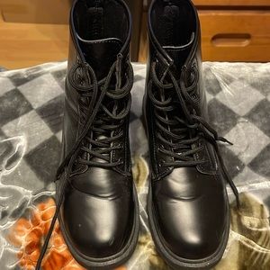 Black tie up boots leather